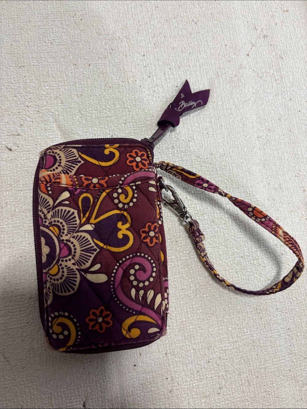This Vera Bradley wristlet wallet in the retired "Safari Sunset" pattern